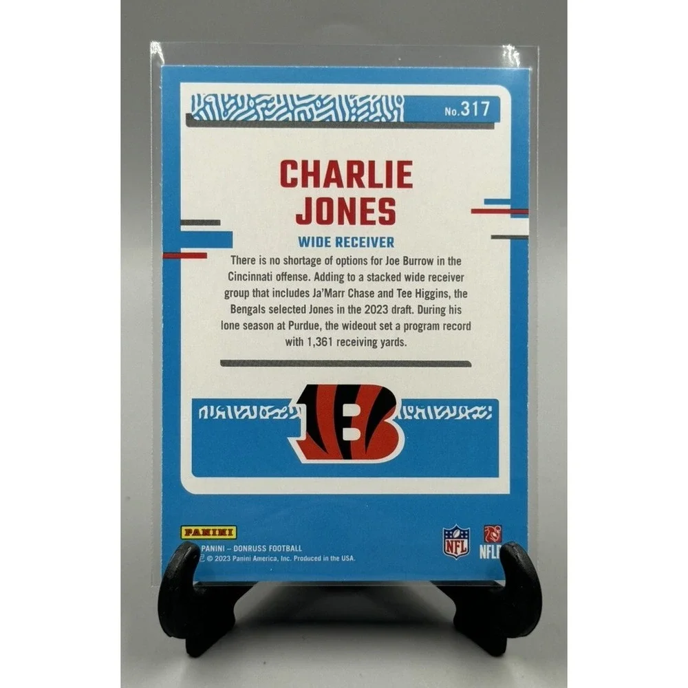 2023‎ Donruss #317 Charlie Jones Press Proof Blue Rated Rookie RC Bengals